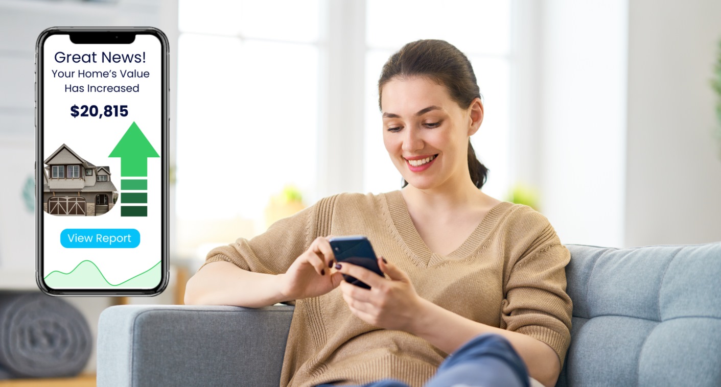 Picture of a lady sitting on the couch, holding a phone